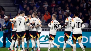 Soccer Football - International Friendly - France v Germany - Groupama Stadium, Lyon, France - March 23, 2024 Germany's Florian Wirtz celebrates scoring their first goal with teammates REUTERS/Benoit Tessier