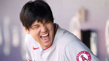 SEATTLE, WASHINGTON - JULY 11: Shohei Ohtani #17 of the Los Angeles Angels laughs in the dugout during the game against the Seattle Mariners at T-Mobile Park on July 11, 2021 in Seattle, Washington.   Steph Chambers/Getty Images/AFP
 == FOR NEWSPAPERS, IN