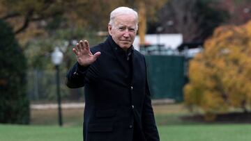 US President Joe Biden walks to the Oval office after getting off Marine One on the South Lawn of the White House.