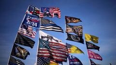 Flags flown by supporters of former US President Donald Trump are shown ahead of a rally featuring Trump at the Arnold Palmer Regional Airport November 5, 2022 in Latrobe, Pennsylvania.