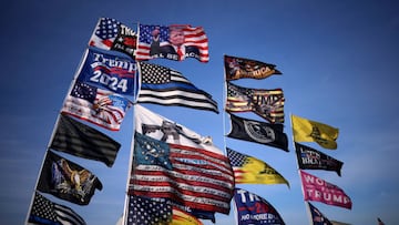 Flags flown by supporters of former US President Donald Trump are shown ahead of a rally featuring Trump at the Arnold Palmer Regional Airport November 5, 2022 in Latrobe, Pennsylvania.