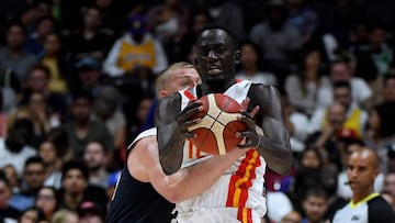 ANAHEIM, CALIFORNIA - AUGUST 16: Ilimane Diop of Spain fends off the defense of Mason Plumlee #12 of the United States during an exhibition game at Honda Center on August 16, 2019 in Anaheim, California.   Harry How/Getty Images/AFP
 == FOR NEWSPAPERS, INTERNET, TELCOS &amp; TELEVISION USE ONLY ==