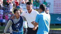 26 June 2022, Bavaria, Munich: Golf: European Tour, BMW International Open, 4th round, men at Golfclub München Eichenried. Haotong Li (M) from China celebrates with his caddie after his victory. Photo: Christian Kolbert/dpa (Photo by Christian Kolbert/picture alliance via Getty Images)