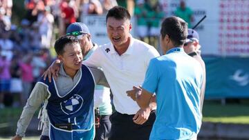26 June 2022, Bavaria, Munich: Golf: European Tour, BMW International Open, 4th round, men at Golfclub München Eichenried. Haotong Li (M) from China celebrates with his caddie after his victory. Photo: Christian Kolbert/dpa (Photo by Christian Kolbert/picture alliance via Getty Images)