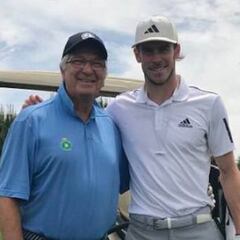 Gareth Bale seeks shelter from the storm on the golf course