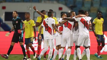 GOIANIA, BRAZIL - JUNE 20: Sergio Pe&ntilde;a and Christian Ramos of Peru celebrate with teammates after their second goal scored by an own goal of Yerry Mina of Colombia (not in frame) during a group B match between Colombia and Peru as part of Copa Amer