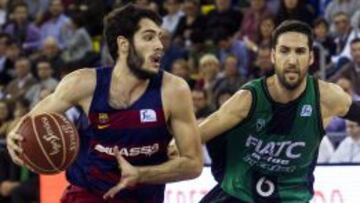 Alex Abrines, defendido por Sergi VIdal.