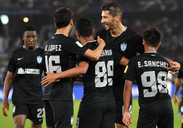 CF Pachuca's Mexican forward Roberto De La Rosa (C) celebrates with his teammates after scoring a goal during the third place football match of the FIFA Club World Cup UAE 2017 between Al-Jazira and CF Pachuca at the Bin Zayed Stadium in Abu Dhabi on December 16, 2017.
/ AFP PHOTO / GIUSEPPE CACACE