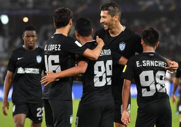 CF Pachuca's Mexican forward Roberto De La Rosa (C) celebrates with his teammates after scoring a goal during the third place football match of the FIFA Club World Cup UAE 2017 between Al-Jazira and CF Pachuca at the Bin Zayed Stadium in Abu Dhabi on December 16, 2017. 
 / AFP PHOTO / GIUSEPPE CACACE