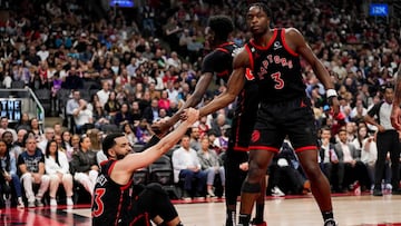 TORONTO, ON - APRIL 12: Fred VanVleet #23 of the Toronto Raptors is helped up by team-mates Chris Boucher #25 and O.G. Anunoby #3 during the 2023 Play-In Tournament against the Chicago Bulls at the Scotiabank Arena on April 12, 2023 in Toronto, Ontario, Canada. NOTE TO USER: User expressly acknowledges and agrees that, by downloading and/or using this Photograph, user is consenting to the terms and conditions of the Getty Images License Agreement.   Andrew Lahodynskyj/Getty Images/AFP (Photo by Andrew Lahodynskyj / GETTY IMAGES NORTH AMERICA / Getty Images via AFP)