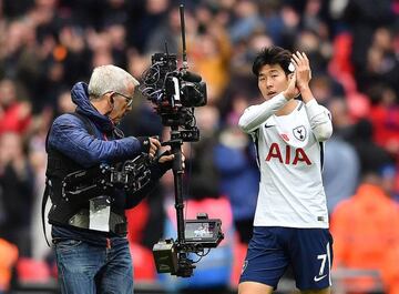 (FILES) In this file photo taken on November 05, 2017 A television camer operator films Tottenham Hotspur's South Korean striker Son Heung-Min as he applauds the fans following the English Premier League football match between Tottenham Hotspur and Crystal Palace at Wembley Stadium in London.  Amazon, the US online retailer has bought the rights to livestream 20 Premier League matches a season on June 7, 2018. / AFP PHOTO / Ben STANSALL