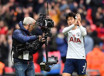 (FILES) In this file photo taken on November 05, 2017 A television camer operator films Tottenham Hotspur's South Korean striker Son Heung-Min as he applauds the fans following the English Premier League football match between Tottenham Hotspur and Crystal Palace at Wembley Stadium in London. Amazon, the US online retailer has bought the rights to livestream 20 Premier League matches a season on June 7, 2018. / AFP PHOTO / Ben STANSALL