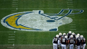 The offense of the San Diego Chargers in huddle against the Kansas City Chiefs