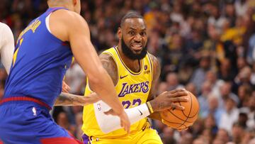 DENVER, COLORADO - OCTOBER 24: LeBron James #23 of the Los Angeles Lakers dribbles the ball up the court in the first half of the NBA Opening night game against the Denver Nuggets at Ball Arena on October 24, 2023 in Denver, Colorado. NOTE TO USER: User expressly acknowledges and agrees that, by downloading and/or using this Photograph, user is consenting to the terms and conditions of the Getty Images License Agreement.   Justin Tafoya/Getty Images/AFP (Photo by Justin Tafoya / GETTY IMAGES NORTH AMERICA / Getty Images via AFP)