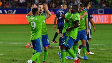 Aug 17, 2019; Carson, CA, USA; Seattle Sounders forward Raul Ruidiaz (9) is congratulated after scoring a first half goal against the Los Angeles Galaxy at StubHub Center. Mandatory Credit: Jake Roth-USA TODAY Sports