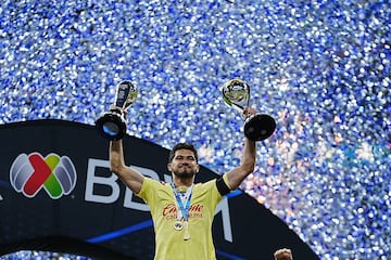    Henry Martin lifts the Clausura 2024 champion and Champion of Champions trophies  during the final second leg match between America and Cruz Azul as part of the Torneo Clausura 2024 Liga BBVA MX at Azteca Stadium on May 26, 2024 in Mexico City, Mexico.