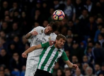 Football Soccer - Real Madrid v Real Betis - Spanish La Liga Santander - Santiago Bernabéu stadium, Madrid, Spain, 12/03/17 -Real Madrid's Sergio Ramos (L) and Real Betis’ Darko Brasanac in action. REUTERS/Sergio Perez