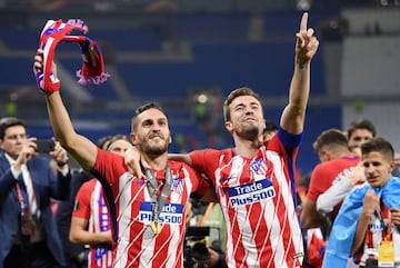 Koke and Gabi celebrate Atlético's victory in the Europa League final.