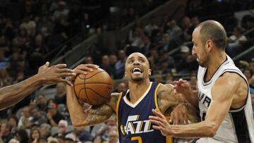 SAN ANTONIO,TX - NOVEMBER 01: George Hill #3 of the Utah Jazz drives on Manu Ginobili #20 of the San Antonio Spurs during game between Utah Jazz and the San Antonio Spurs at AT&T Center on November 1, 2016 in San Antonio, Texas. NOTE TO USER: User expressly acknowledges and agrees that , by downloading and or using this photograph, User is consenting to the terms and conditions of the Getty Images License Agreement. Ronald Cortes/Getty Images/AFP
== FOR NEWSPAPERS, INTERNET, TELCOS & TELEVISION USE ONLY ==