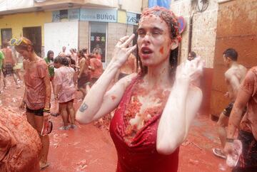 A reveller gestures during the annual Tomatina festival in Bunol near Valencia, Spain, August 30, 2017. REUTERS/Heino Kalis