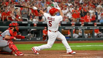 St. Louis Cardinals designated hitter Albert Pujols hits a game tying two run home run for his 698th career home run during the sixth inning against the Cincinnati Reds at Busch Stadium.