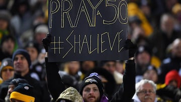 PITTSBURGH, PA - DECEMBER 10: A Baltimore Ravens fan holds up a sign honoring Ryan Shazier #50 of the Pittsburgh Steelers who was injured in a game last week during the game at Heinz Field on December 10, 2017 in Pittsburgh, Pennsylvania.   Joe Sargent/Getty Images/AFP
 == FOR NEWSPAPERS, INTERNET, TELCOS &amp; TELEVISION USE ONLY ==