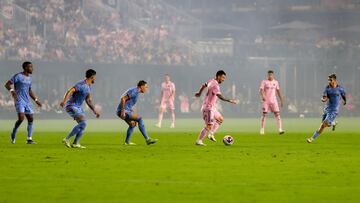 Inter Miami's Argentine forward #10 Lionel Messi runs with the ball surrounded by New York City FC players during a Major League Soccer (MLS) friendly football match between Inter Miami CF and New York City FC at DRV PNK Stadium in Fort Lauderdale, Florida, on November 10, 2023. (Photo by Chris Arjoon / AFP)