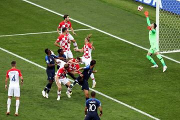 Mario Mandzukic of Croatia scores an own goal from Antoine Griezmann free-kick.