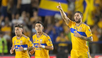 Tigres' Andre-Pierre Gignac (R) celebrates after scoring against Leon during their Mexican Apertura 2023 football tournament match at the Universitario stadium in Monterrey, Mexico, on July 15, 2023. (Photo by Julio Cesar AGUILAR / AFP)