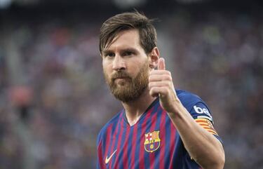 Barça double Madrid's weekend tally hitting Huesca for eight