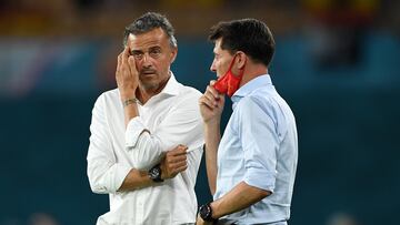 SEVILLE, SPAIN - JUNE 14: Luis Enrique, Head Coach of Spain interacts with Jesus Casas, Assistant Head Coach of Spain during the UEFA Euro 2020 Championship Group E match between Spain and Sweden at the La Cartuja Stadium on June 14, 2021 in Seville, Spain. (Photo by Aitor Alcalde - UEFA/UEFA via Getty Images)