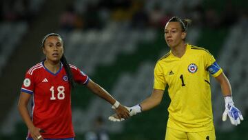 Chile's Camila Saez (L) and Chile's goalkeeper Claudia Endler high-five during their Conmebol 2022 women's Copa America football tournament match at the Centenario stadium in Armenia, Colombia, on July 24, 2022. (Photo by Paola MAFLA / AFP) (Photo by PAOLA MAFLA/AFP via Getty Images)