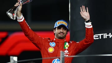Formula One F1 - Abu Dhabi Grand Prix - Yas Marina Circuit, Abu Dhabi, United Arab Emirates - December 8, 2024 Ferrari's Carlos Sainz Jr. celebrates on the podium after finishing second REUTERS/Amr Alfiky