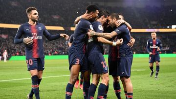 Paris Saint-Germain's Argentinian forward Angel Di Maria (C) is congratuled by teammates after scoring a goal during the French L1 football match between Paris Saint-Germain (PSG) and Montpellier (MHSC) at the Parc des Princes stadium in Paris on Feb