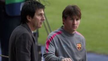 Leo Messi junto a su padre.