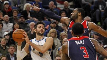 Mar 13, 2017; Minneapolis, MN, USA; Minnesota Timberwolves guard Ricky Rubio (9) looks to pass the ball as  Washington Wizards guard John Wall (2) defends in the third quarter at Target Center. Rubio sets a franchise record for assists with19 as the Timberwolves win 119-104. Mandatory Credit: Bruce Kluckhohn-USA TODAY Sports