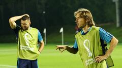 Soccer Football - FIFA World Cup Qatar 2022 - Croatia Training - Al Erssal Training Site 3, Doha, Qatar - December 8, 2022  Croatia's Luka Modric and Mateo Kovacic during training REUTERS/Bernadett Szabo