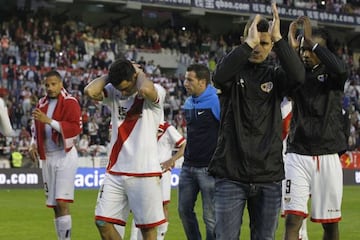 Rayo's players come to terms with relegation after the final whistle.