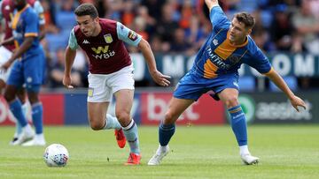 Soccer Football - Pre Season Friendly - Shrewsbury Town v Aston Villa - Montgomery Waters Meadow, Shrewsbury, Britain - July 21, 2019 Aston Villa's John McGinn in action with Shrewsbury Town's Brad Walker Action Images via Reuters/John Clift