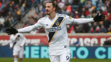 Zlatan Ibrahimovic of Los Angeles Galaxy celebrates after scoring against the Chicago Fire during the first half of a MLS soccer match on April 14, 2018 at the Toyota Park in Bridgeview, Illinois.  / AFP PHOTO / Kamil Krzaczynski