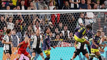 Colombia's midfielder #02 Manuela Vanegas (top) scores her team's second goal during the Australia and New Zealand 2023 Women's World Cup Group H football match between Germany and Colombia at Sydney Football Stadium in Sydney on July 30, 2023. (Photo by DAVID GRAY / AFP)