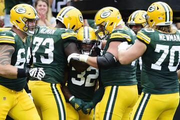 Los jugadores de la Green Bay Packers celebran una anotación