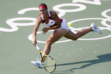 Muguruza crashes out of Rio; Nadal breezes through