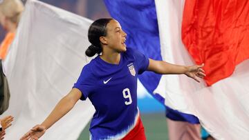 Jul 16, 2024; Washington, D.C., USA; United States forward Mallory Swanson (9) shakes hands with team United States' family members during a send-off ceremony after a friendly against Costa Rica at Audi Field. Mandatory Credit: Geoff Burke-USA TODAY
