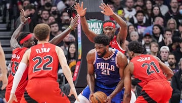 TORONTO, ON - APRIL 7: Joel Embiid #21 of the Philadelphia 76ers is guarded by Thaddeus Young #21, Malachi Flynn #22, Pascal Siakam #43, and Precious Achiuwa #5 of the Toronto Raptors during the second half of their basketball game at the Scotiabank Arena on April 7, 2022 in Toronto, Ontario, Canada. NOTE TO USER: User expressly acknowledges and agrees that, by downloading and/or using this Photograph, user is consenting to the terms and conditions of the Getty Images License Agreement.   Mark Blinch/Getty Images/AFP
 == FOR NEWSPAPERS, INTERNET, TELCOS &amp; TELEVISION USE ONLY ==