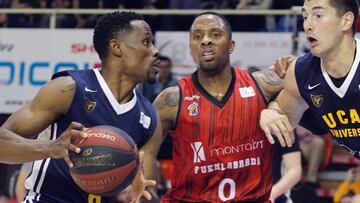 GRAF3100. FUENLABRADA, 31/03/2019.- El jugador del Montakit Fuenlabrada Earl Rowland (c), disputa un balón contra el jugador del UCAM Murcia Charlon Kloof (i), durante el partido de la Liga Endesa de la jornada 25 que se disputa en el Pabellón Fernando Martín en Fuenlabrada.- EFE/Víctor Lerena