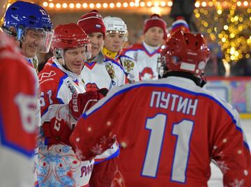 Vladimir Putin took part in the traditional Christmas day ice hockey exhibition match in Red Square and led his side to victory, scoring eight times in an 8-5 victory, according to the Associated Press and Reuters, although the Kremlin match report credit