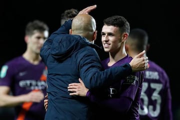 Pep Guardiola congratulates Foden after the game.