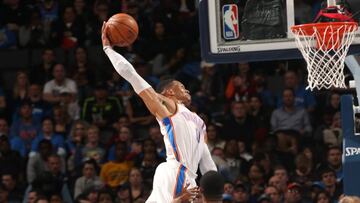 OKLAHOMA CITY, OK - DECEMBER 20: Russell Westbrook #0 of the Oklahoma City Thunder dunks against the Utah Jazz on December 20, 2017 at Chesapeake Energy Arena in Oklahoma City, Oklahoma. NOTE TO USER: User expressly acknowledges and agrees that, by downloading and or using this photograph, User is consenting to the terms and conditions of the Getty Images License Agreement. Mandatory Copyright Notice: Copyright 2017 NBAE (Photo by Layne Murdoch/NBAE via Getty Images) *** BESTPIX ***