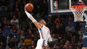 OKLAHOMA CITY, OK - DECEMBER 20:  Russell Westbrook #0 of the Oklahoma City Thunder dunks against the Utah Jazz on December 20, 2017 at Chesapeake Energy Arena in Oklahoma City, Oklahoma. NOTE TO USER: User expressly acknowledges and agrees that, by downloading and or using this photograph, User is consenting to the terms and conditions of the Getty Images License Agreement. Mandatory Copyright Notice: Copyright 2017 NBAE (Photo by Layne Murdoch/NBAE via Getty Images) *** BESTPIX ***